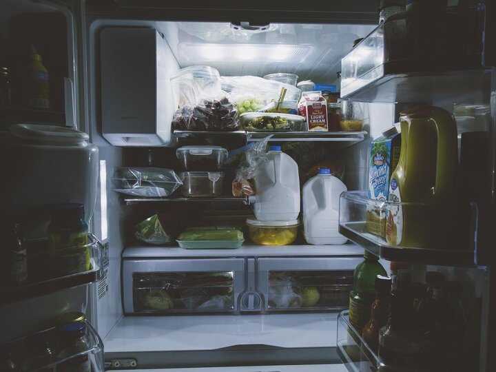 Open fridge with food